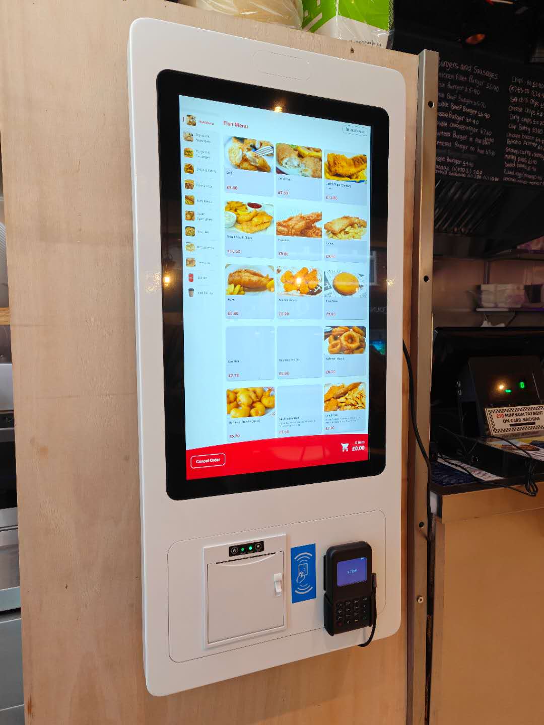 Wall-mounted self-service kiosk